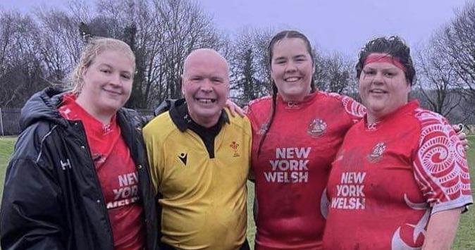 Referee David Munday with Pembroke players Elizabeth Dufresny (capt), Chloe Jones (Vice-capt) and Angharad Scourfield